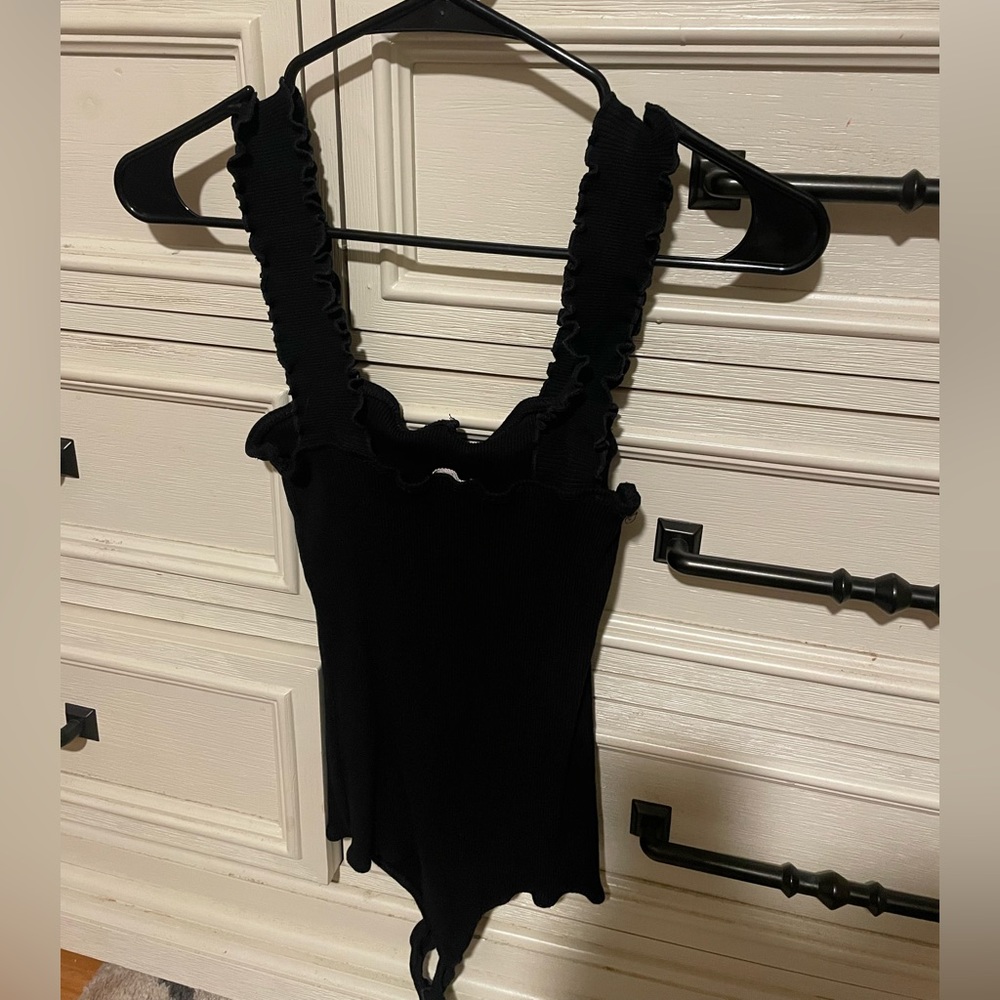 Dressy black bodysuit with fun straps!